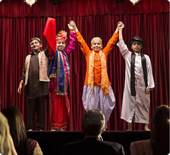 students participating in theatre activities at podar education school