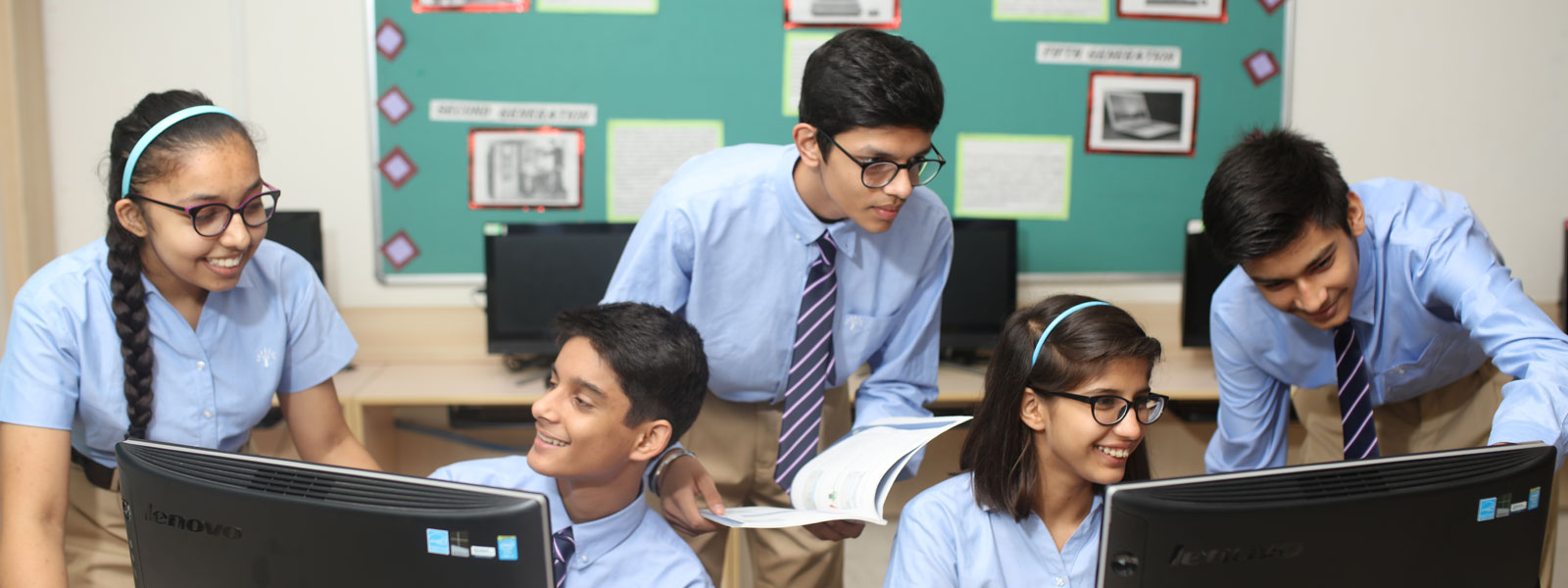students using computers in the lab at podar education school